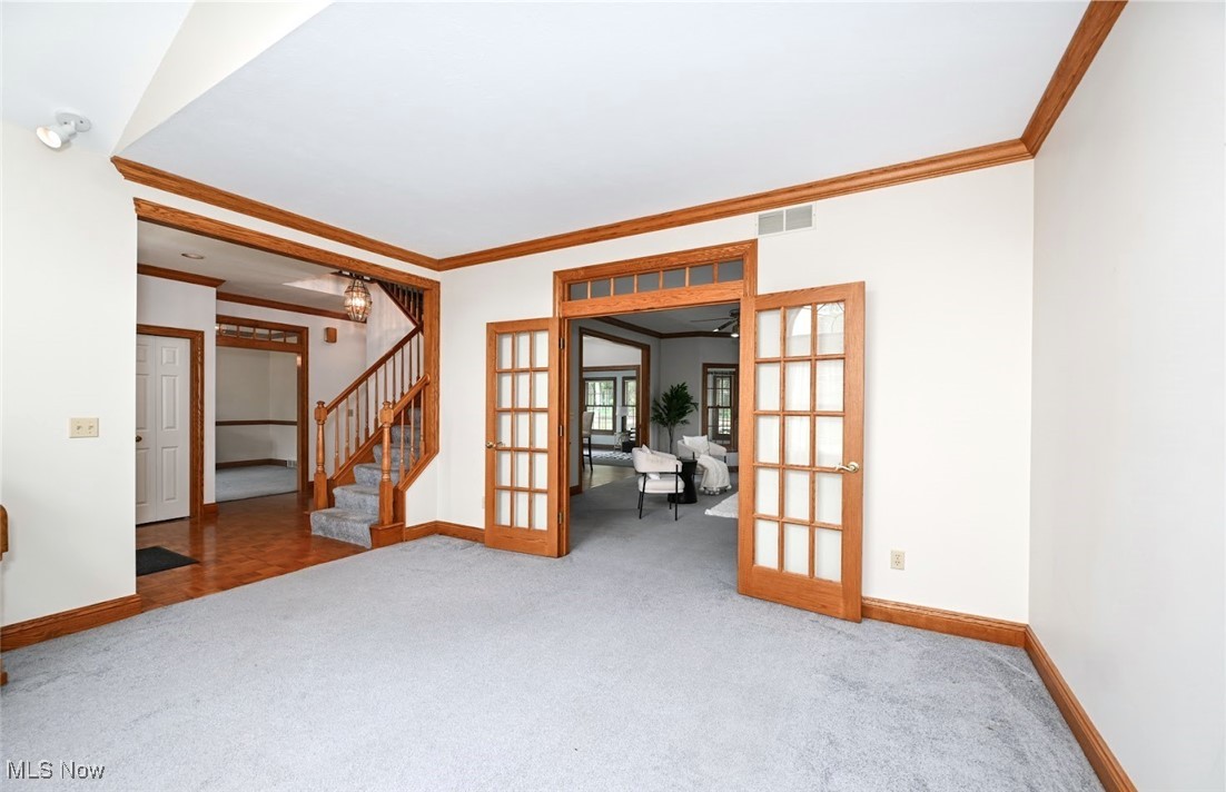 452 Herbert Road Akron, OH 44312 - Photo 9 of 48 *LIVING RM W/VAULTED CEILING AND ARCHED BEAUTIFUL WINDOW, FRENCH DOOR ENTRY TO FAMILY RM ~