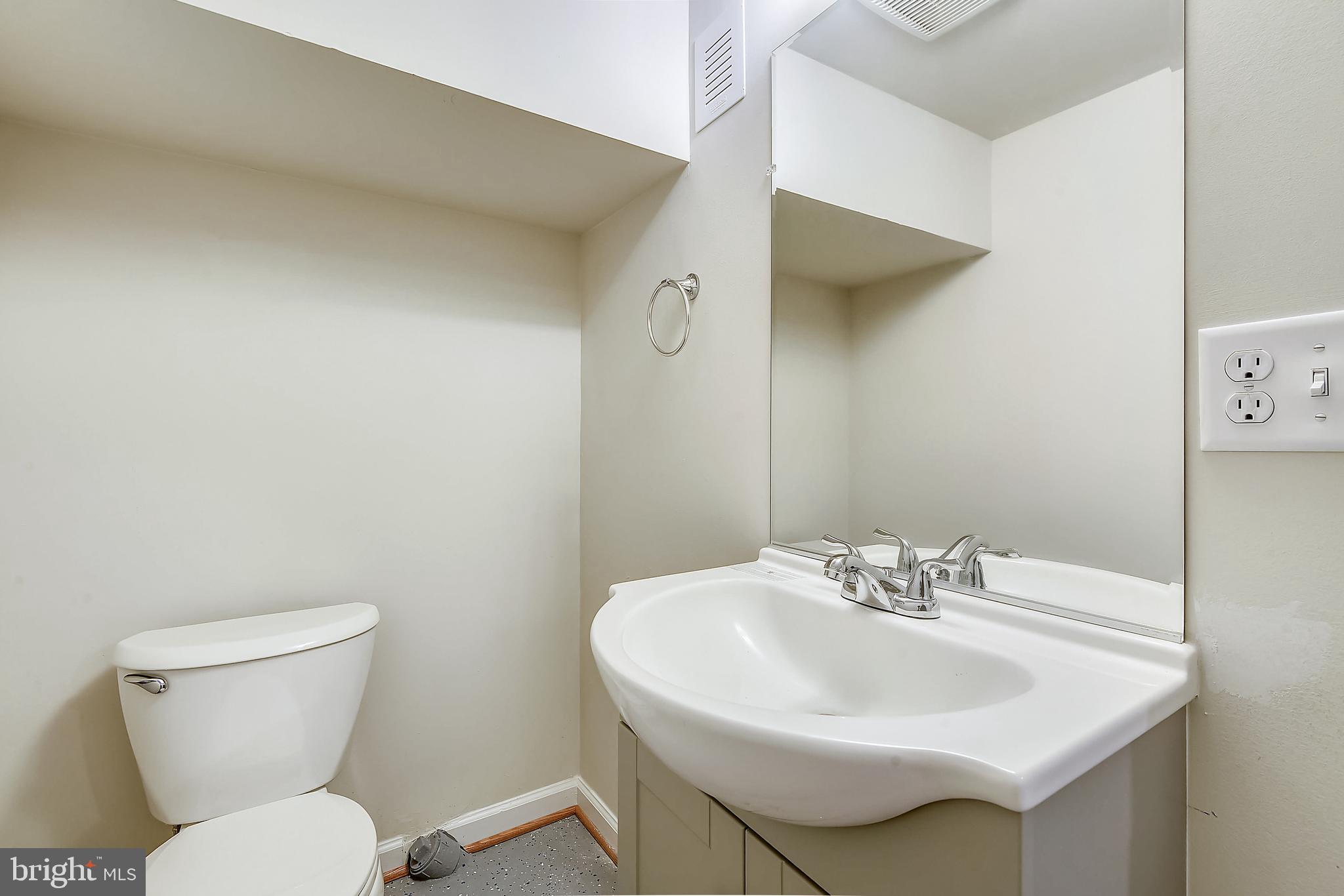 7820 Renshaw Road Pasadena, MD 21122 - Photo 51 of 76 1/2 bath on lower level
