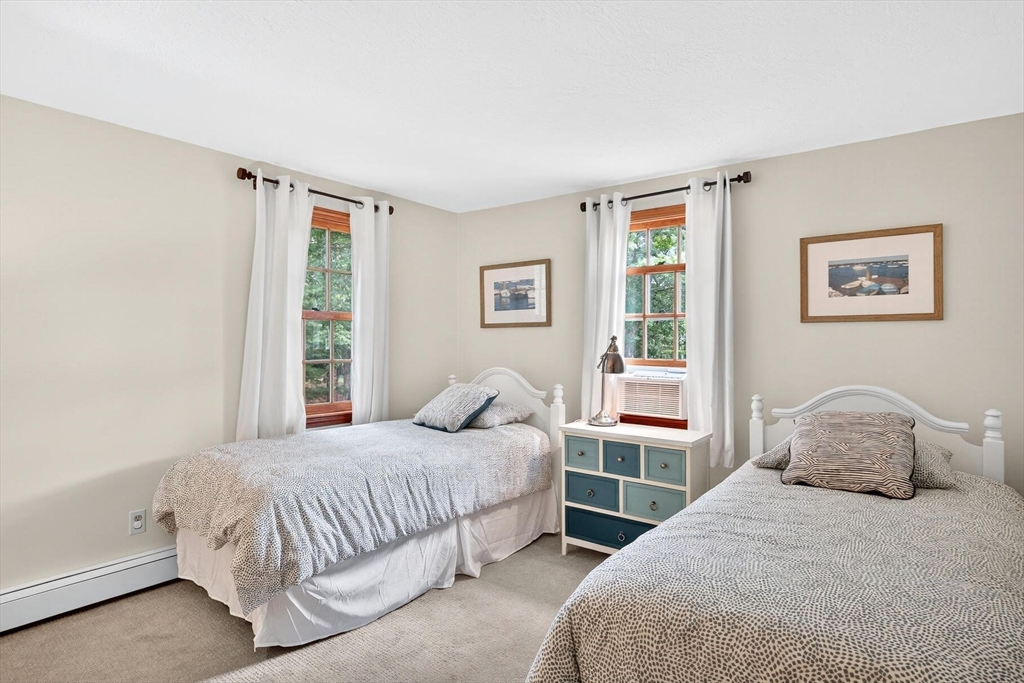 12 Tracy Road Barnstable, MA 02635 - Photo 38 of 42 a bedroom with a bed and window