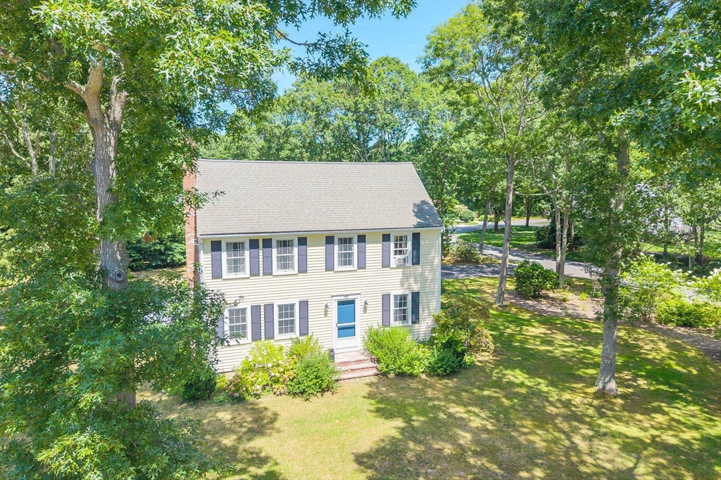 12 Tracy Road Barnstable, MA 02635 - Photo 40 of 42 front view of a house with a yard