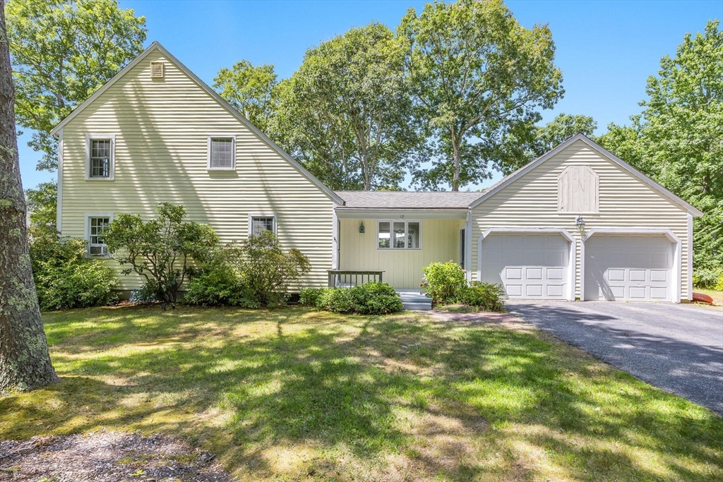 12 Tracy Road Barnstable, MA 02635 - Photo 41 of 42 a view of a house with backyard and garden