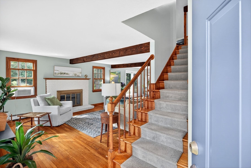 12 Tracy Road Barnstable, MA 02635 - Photo 6 of 42 a view of entryway livingroom and hall with wooden floor