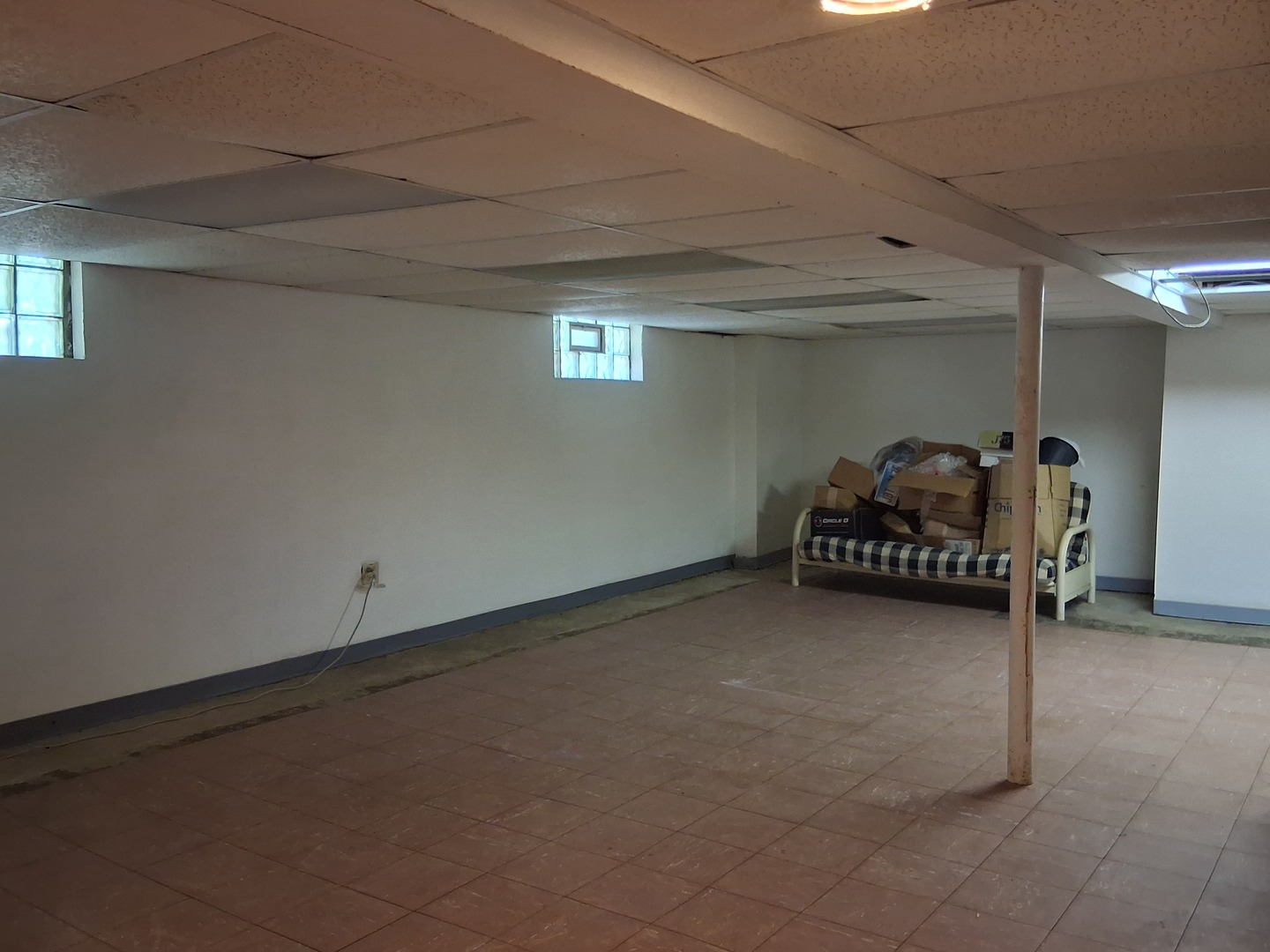 10557 South Racine Avenue Chicago, IL 60643 - Photo 16 of 20 a room with a couch and gym equipment