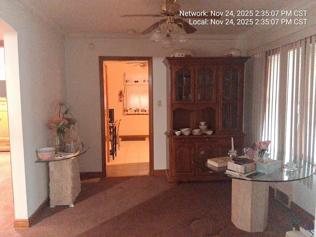 a bathroom with a sink a toilet and a window