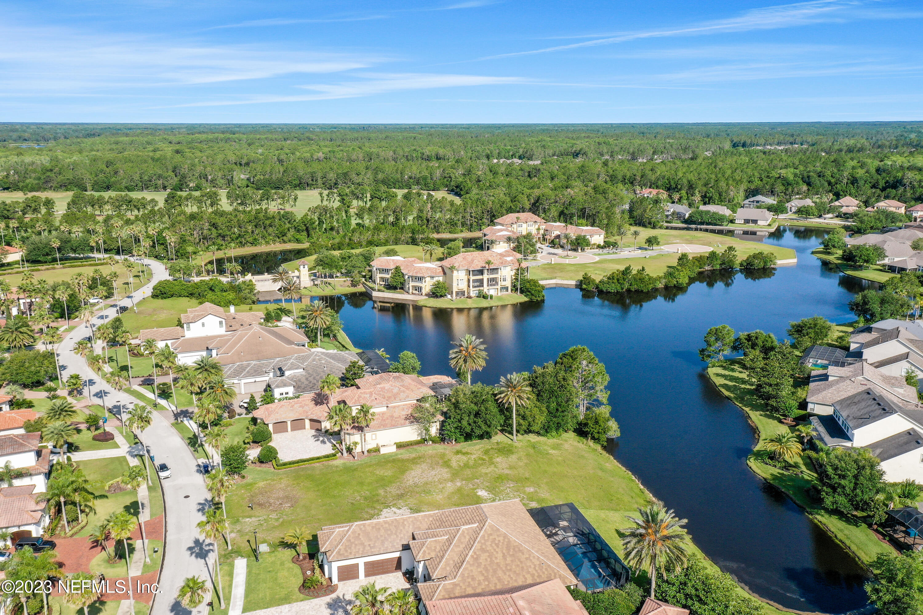 735 Promenade Pointe Drive St. Augustine, FL 32095 - Photo 2 of 22 a view of a city with lots of residential buildings ocean and mountain view