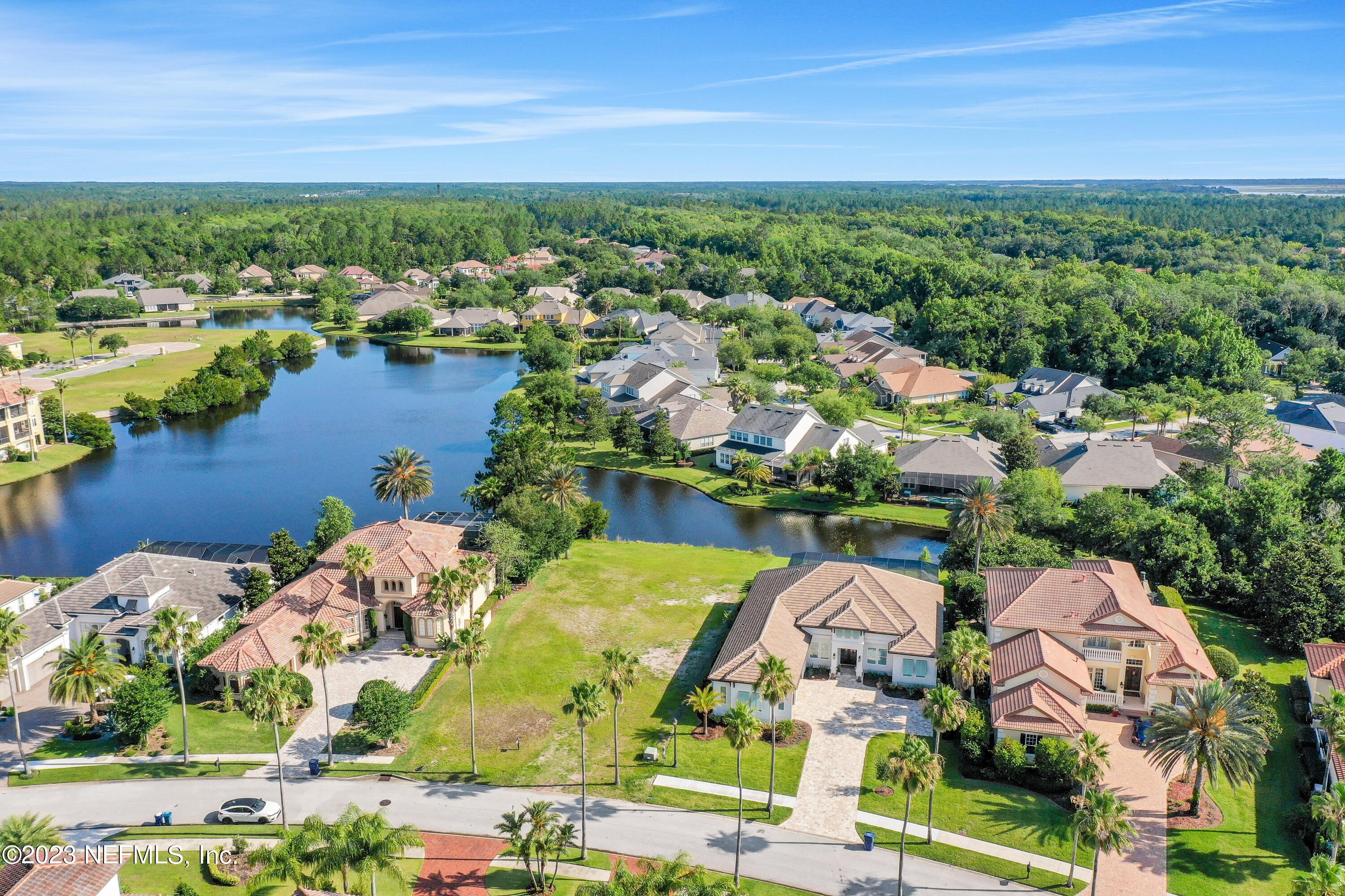 735 Promenade Pointe Drive St. Augustine, FL 32095 - Photo 4 of 22 an aerial view of residential houses with outdoor space