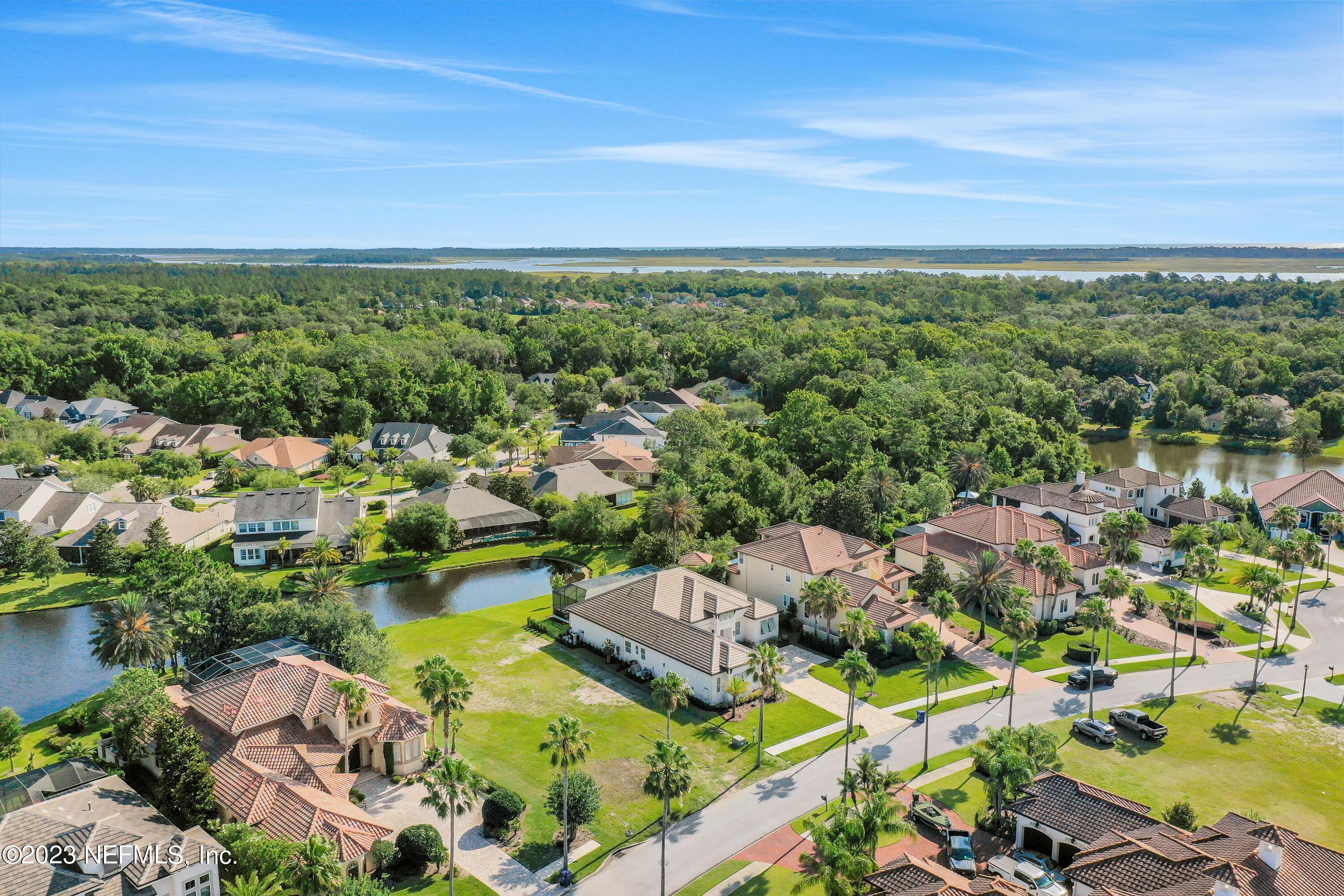 735 Promenade Pointe Drive St. Augustine, FL 32095 - Photo 5 of 22 an aerial view of residential houses with outdoor space and trees