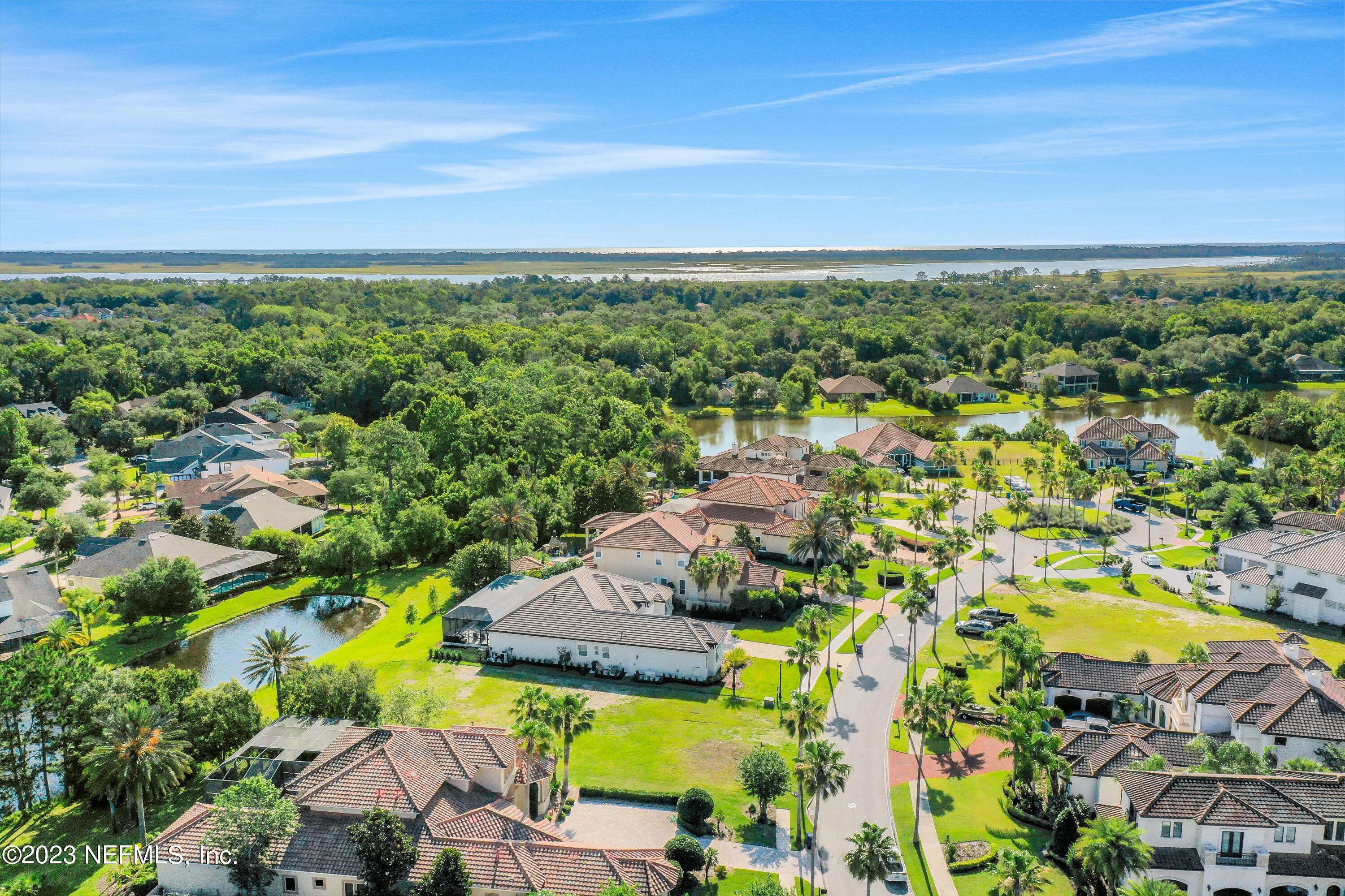 735 Promenade Pointe Drive St. Augustine, FL 32095 - Photo 6 of 22 an aerial view of residential houses with outdoor space and trees