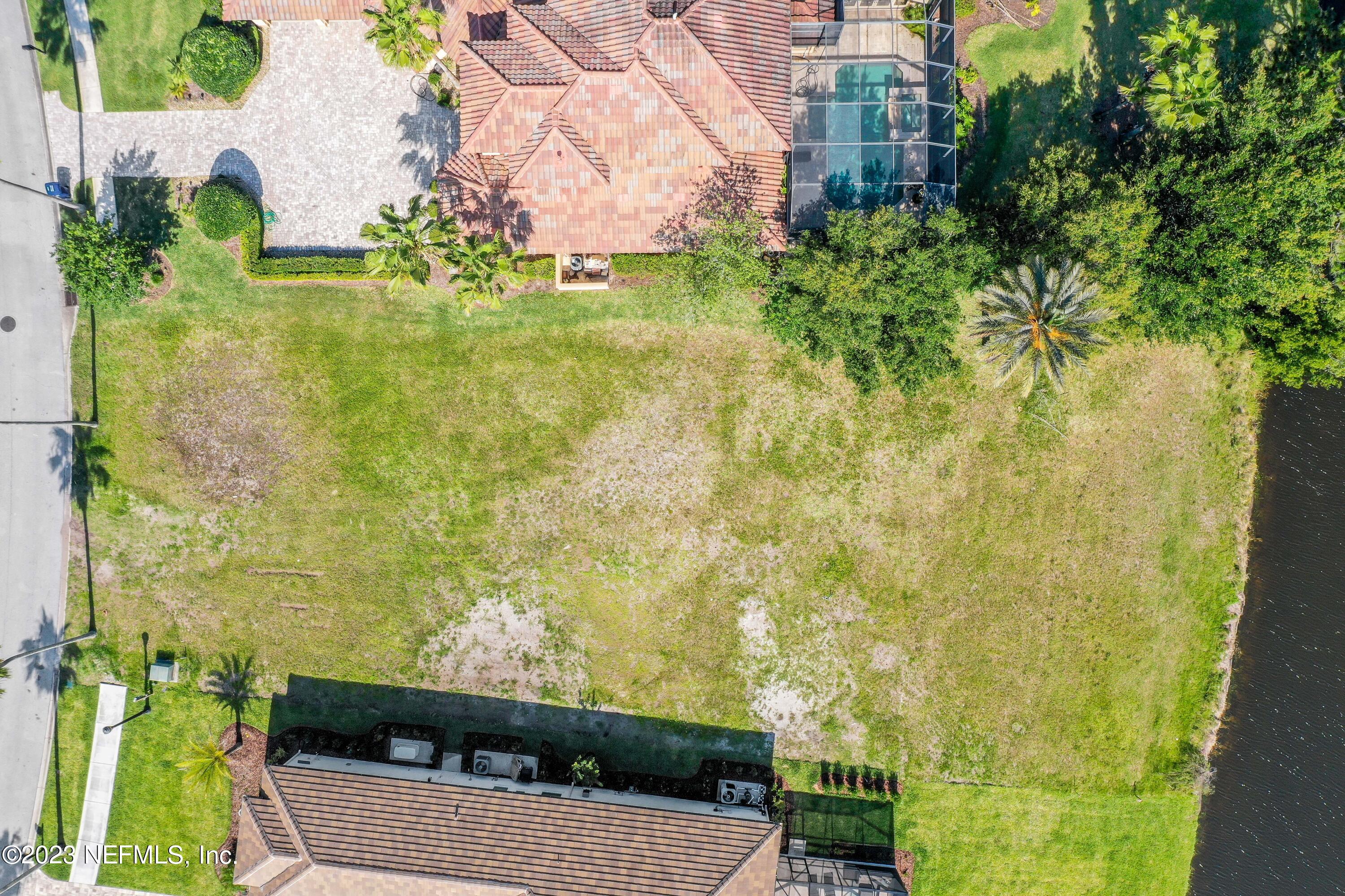 735 Promenade Pointe Drive St. Augustine, FL 32095 - Photo 7 of 22 a view of a garden