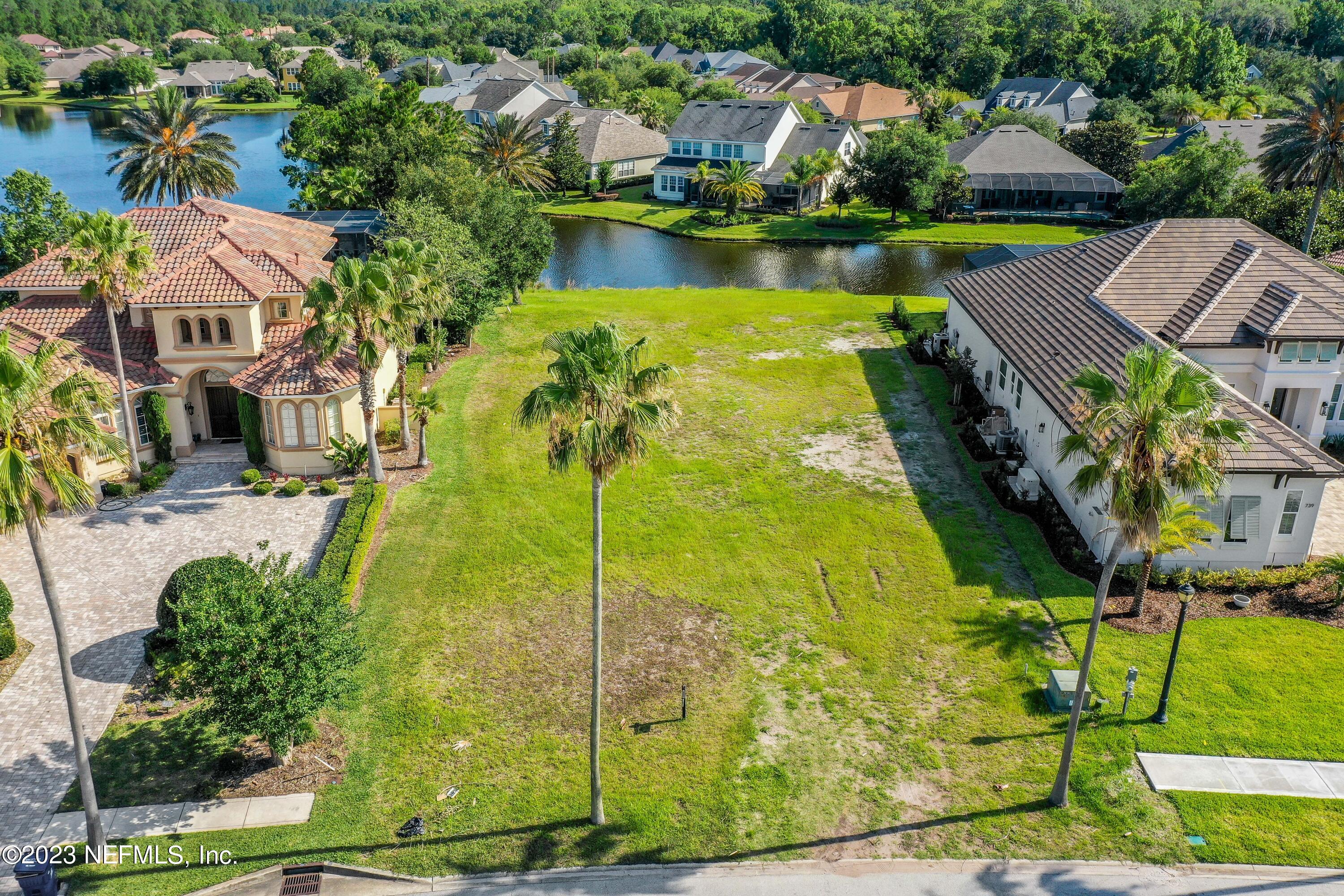735 Promenade Pointe Drive St. Augustine, FL 32095 - Photo 8 of 22 an aerial view of residential houses with outdoor space and swimming pool
