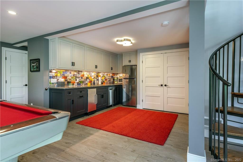 8 Cedar Point Drive Sherman, CT 06784 - Photo 20 of 30 a room with table chair and window