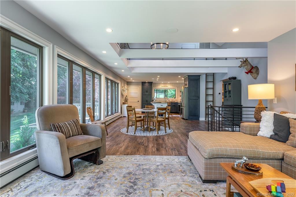 8 Cedar Point Drive Sherman, CT 06784 - Photo 27 of 30 a living room with furniture and a large window