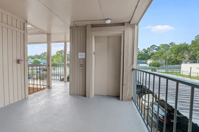 a view of a hallway with entryway