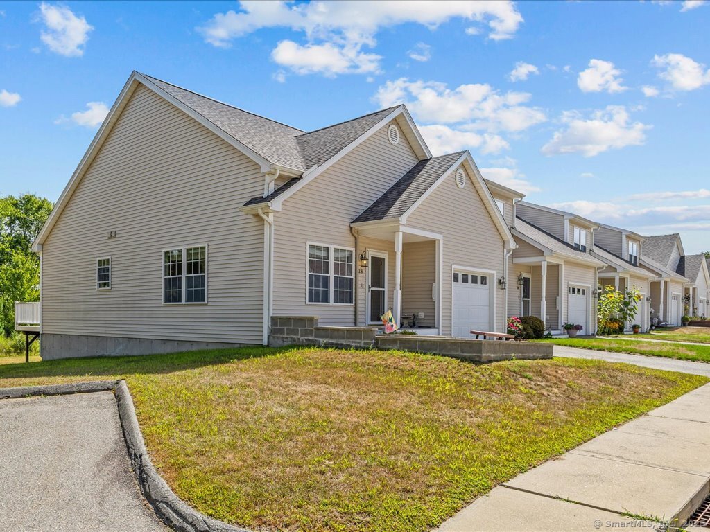 28 Cross Creek Road, Unit 28 Plainfield, CT 06374 - Photo 1 of 1 a view of a house with a swimming pool
