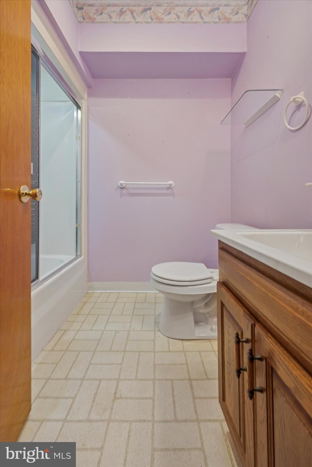 422 West Moreland Avenue Hatboro, PA 19040 - Photo 13 of 17 a bathroom with a granite countertop toilet and a sink