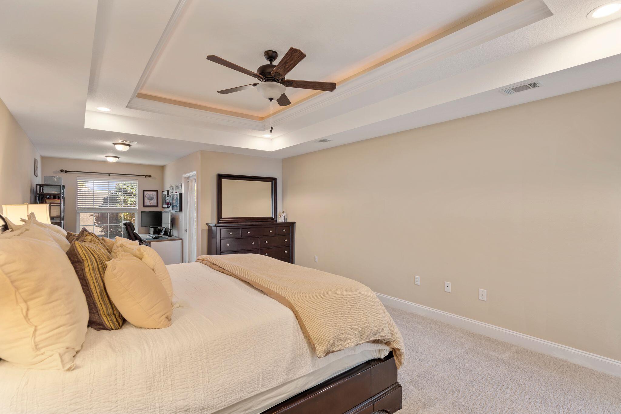 2933 Chancel Avenue Crestview, FL 32539 - Photo 21 of 44 a bedroom with a bed and a tv
