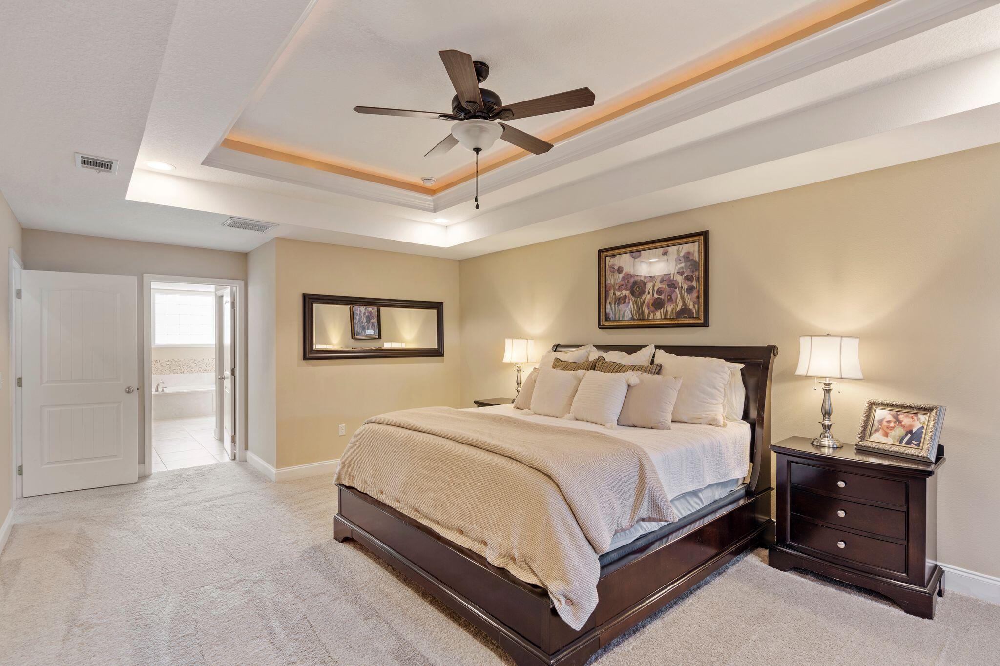 2933 Chancel Avenue Crestview, FL 32539 - Photo 22 of 44 a bedroom with a bed and a tv