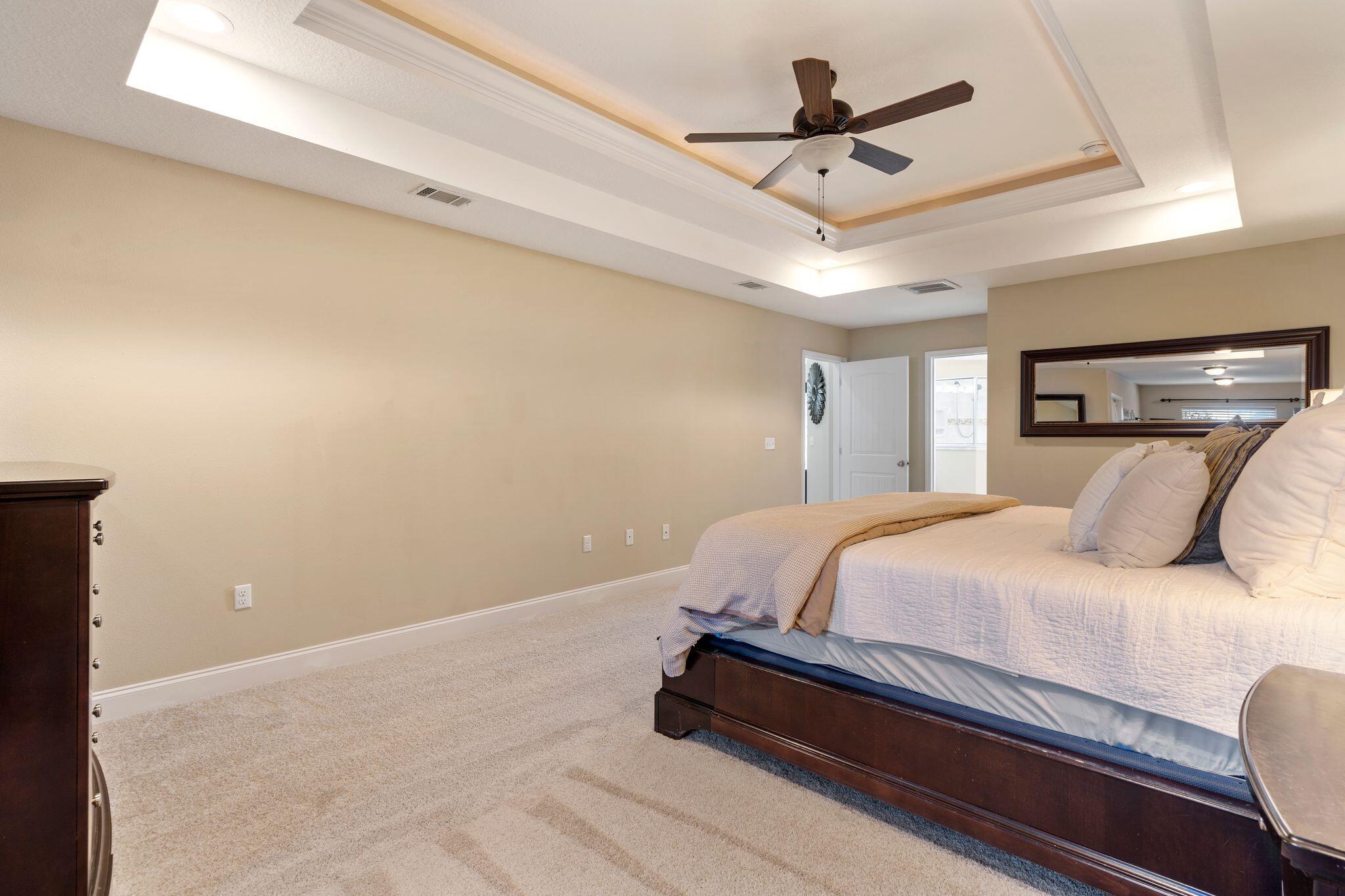 2933 Chancel Avenue Crestview, FL 32539 - Photo 24 of 44 a bedroom with a bed and ceiling fan