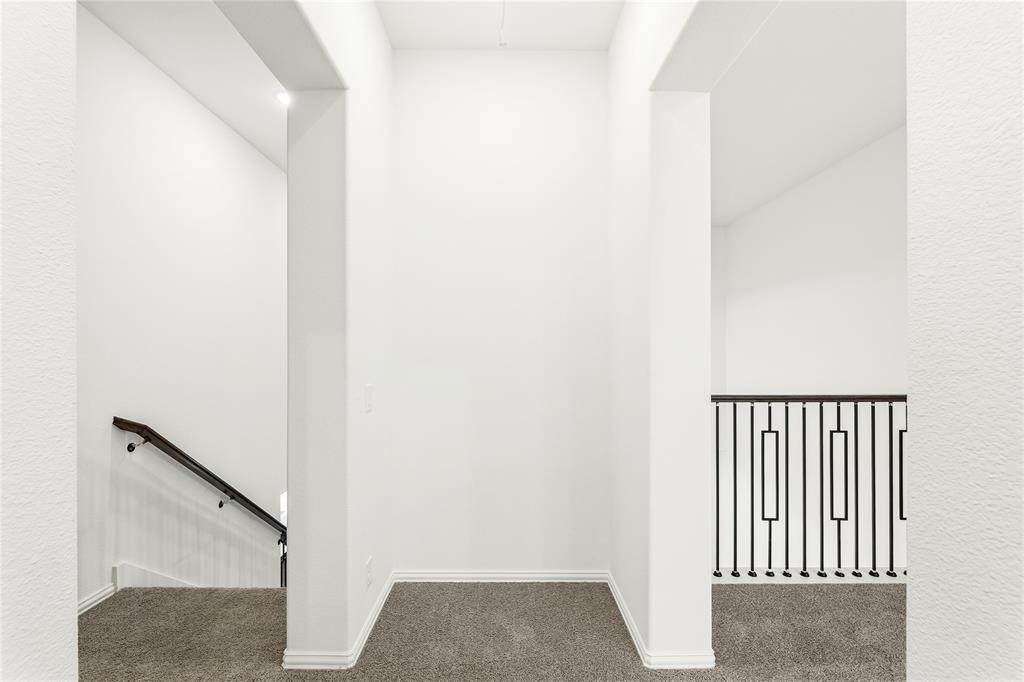 1145 Hitching Post Way Oak Point, TX 75068 - Photo 29 of 39 a view of a hallway