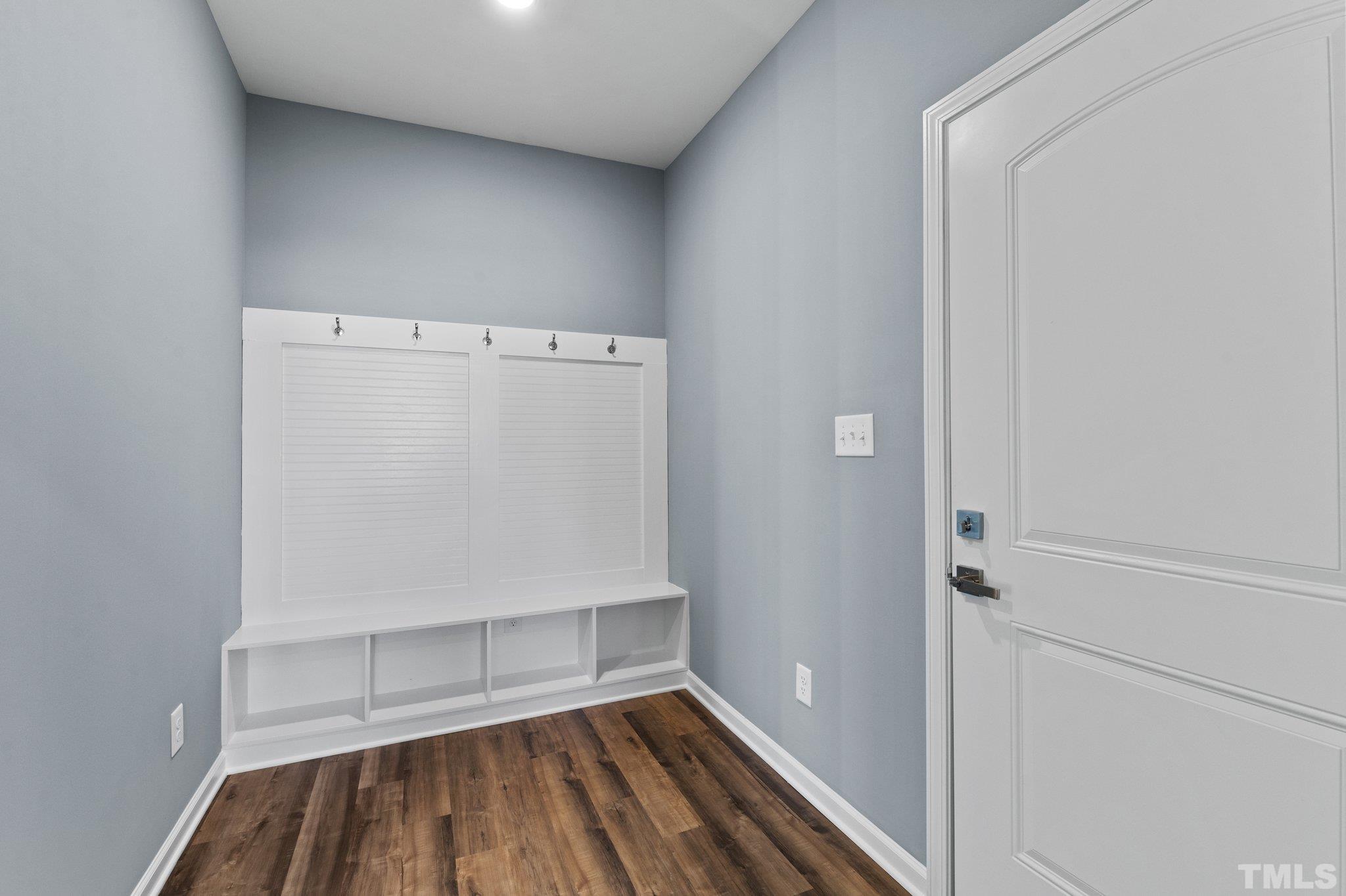 9655 Chapman Road Bailey, NC 27807 - Photo 14 of 33 a view of walk in closet with empty racks