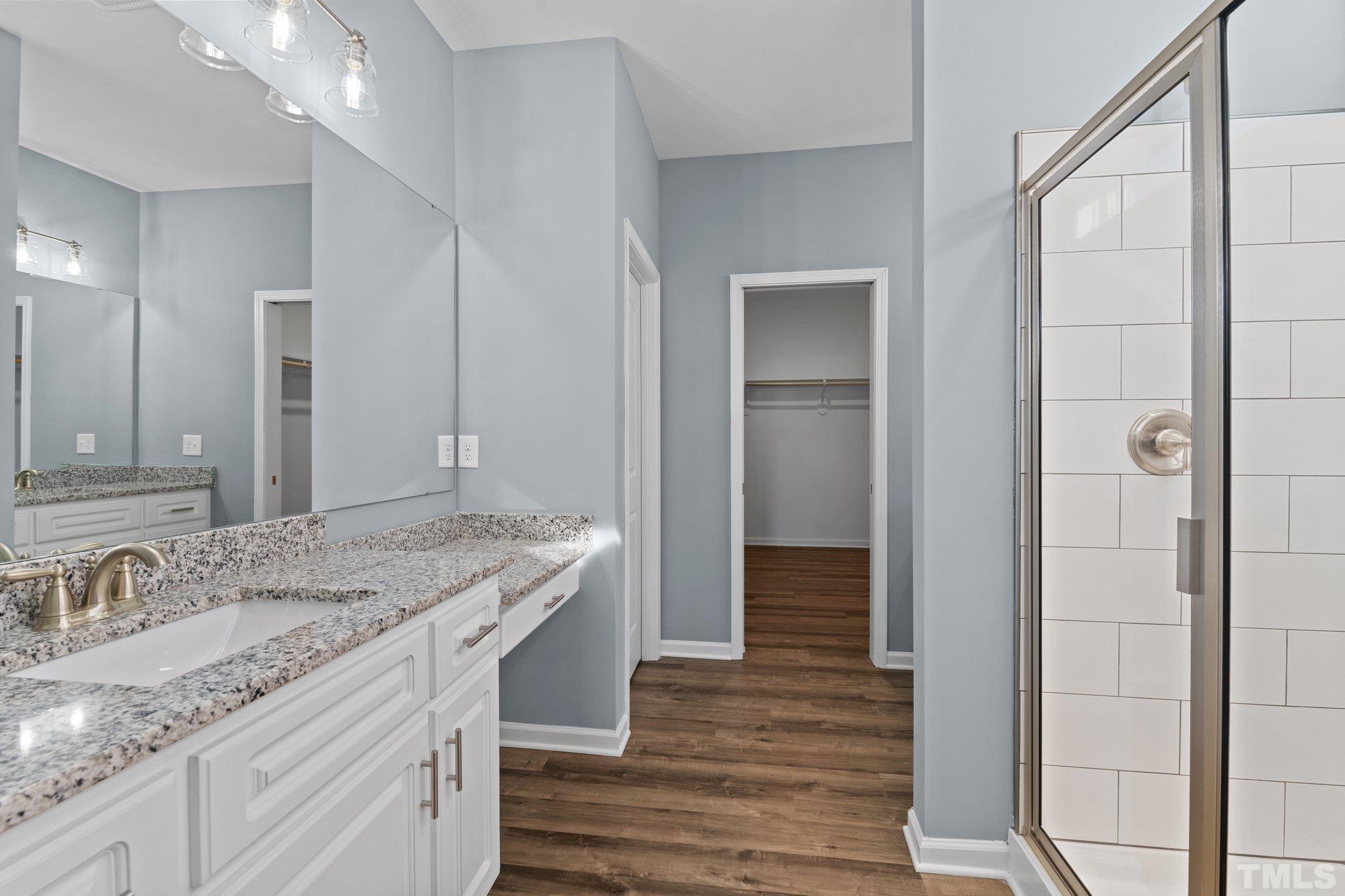 9655 Chapman Road Bailey, NC 27807 - Photo 20 of 33 a bathroom with a granite countertop sink and a mirror