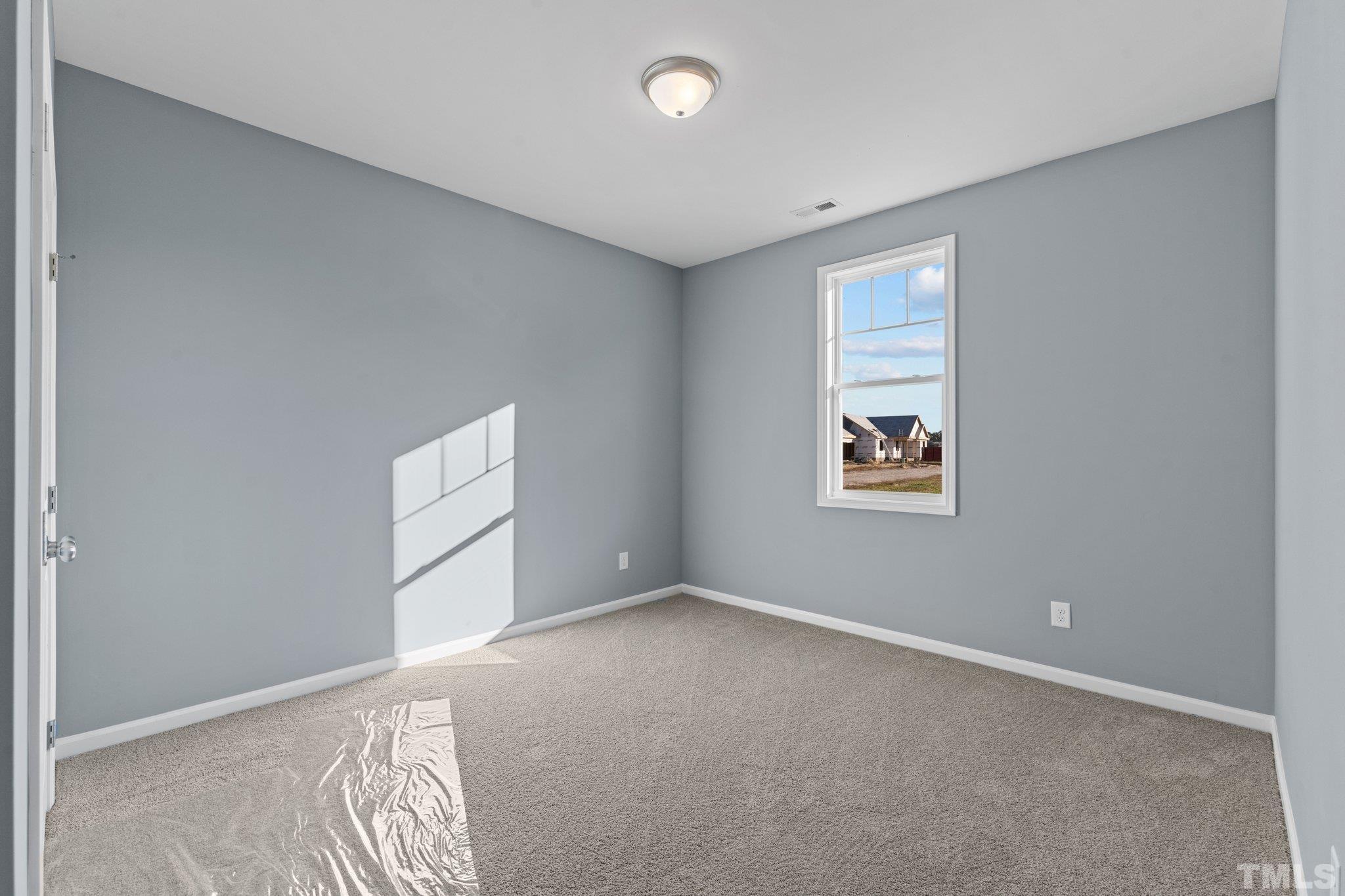 9655 Chapman Road Bailey, NC 27807 - Photo 24 of 33 an empty room with windows