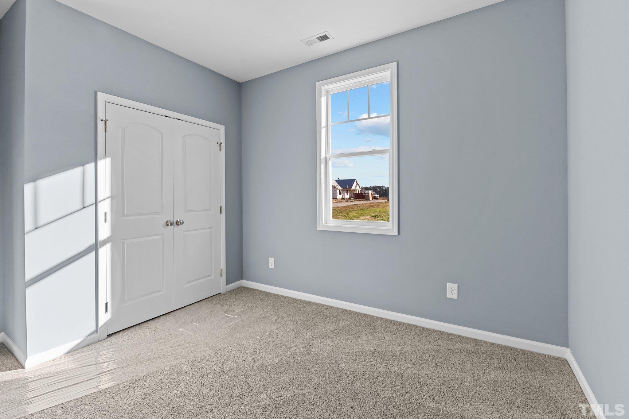 9655 Chapman Road Bailey, NC 27807 - Photo 26 of 33 an empty room with windows
