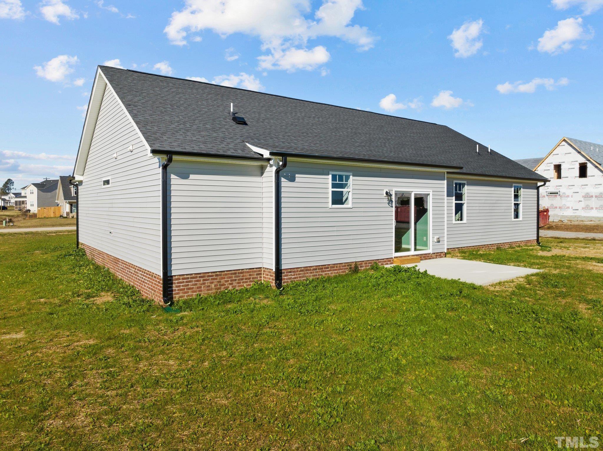 9655 Chapman Road Bailey, NC 27807 - Photo 30 of 33 a front view of a house with a yard