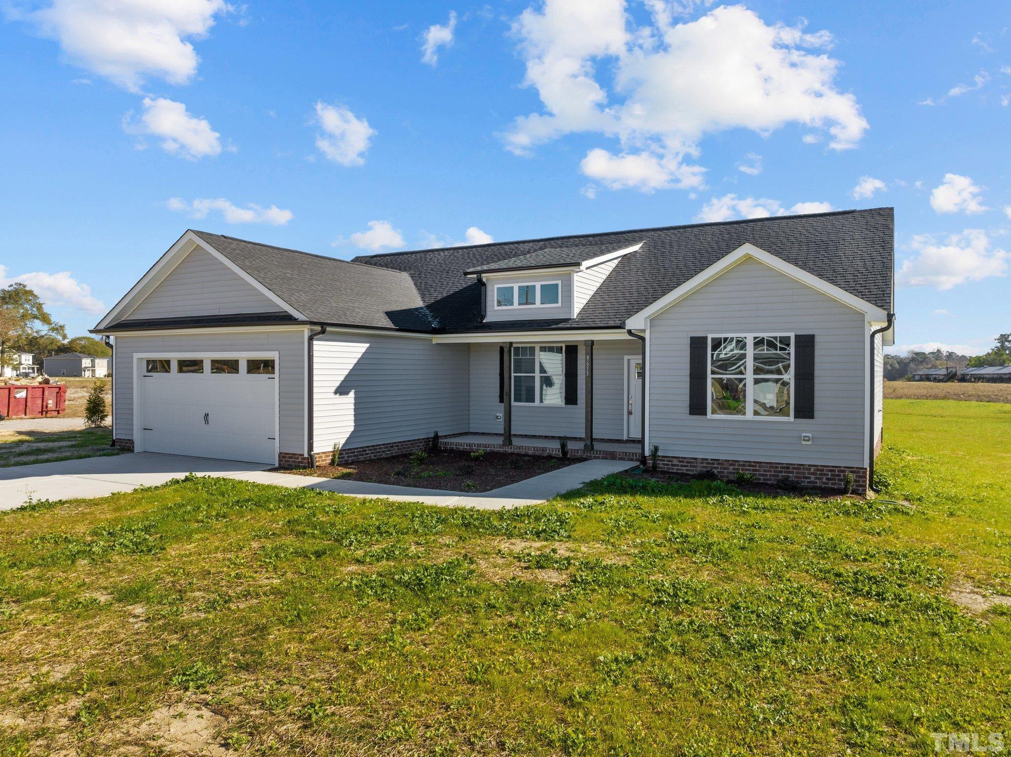 9655 Chapman Road Bailey, NC 27807 - Photo 31 of 33 a view of a house with pool and a yard