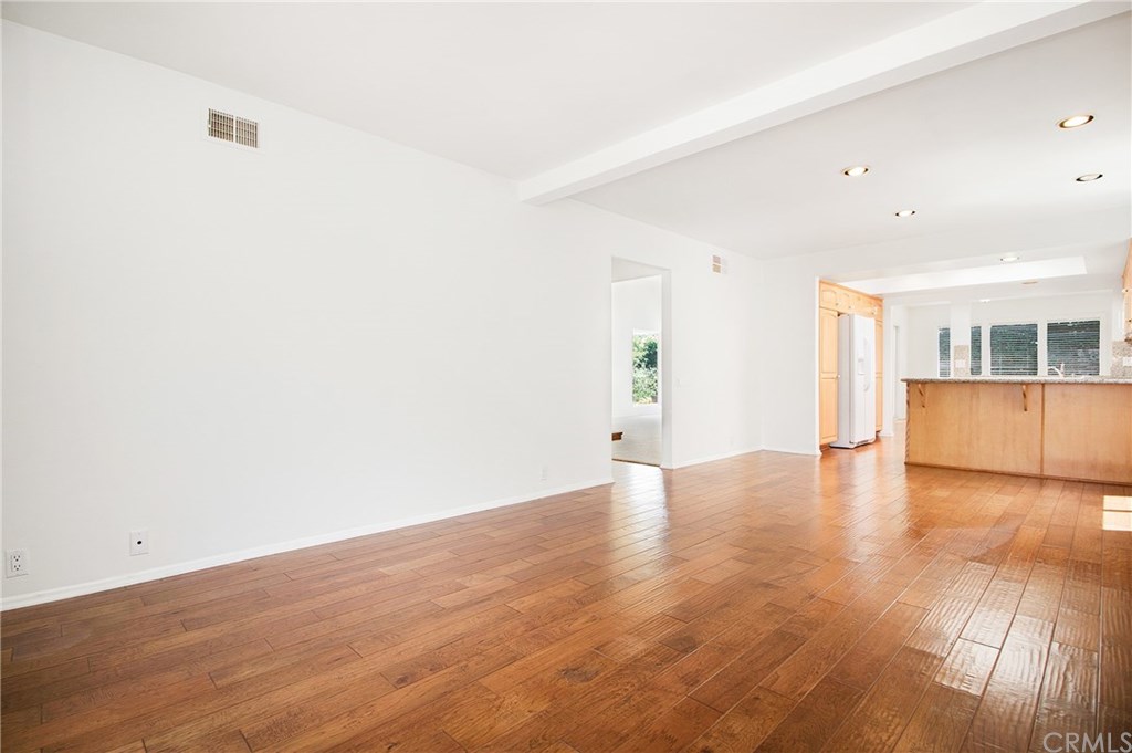 23822 Cassandra Bay Dana Point, CA 92629 - Photo 4 of 24 Family Room is open to Kitchen Bar