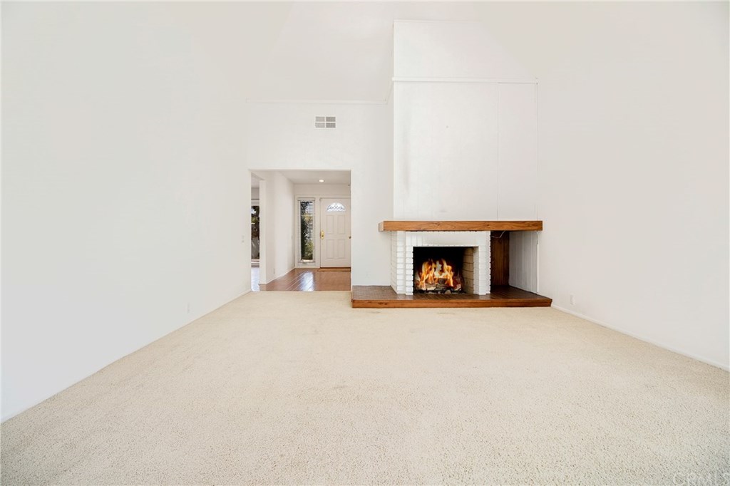 23822 Cassandra Bay Dana Point, CA 92629 - Photo 6 of 24 Formal Living Room with Fireplace