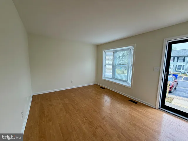 a view of an empty room and window