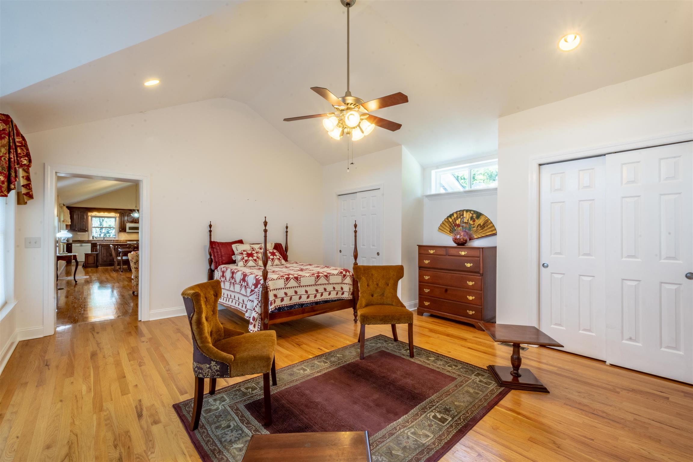 439 Agnew Road Pulaski, TN 38478 - Photo 13 of 30 a living room with furniture a dining table and a chandelier