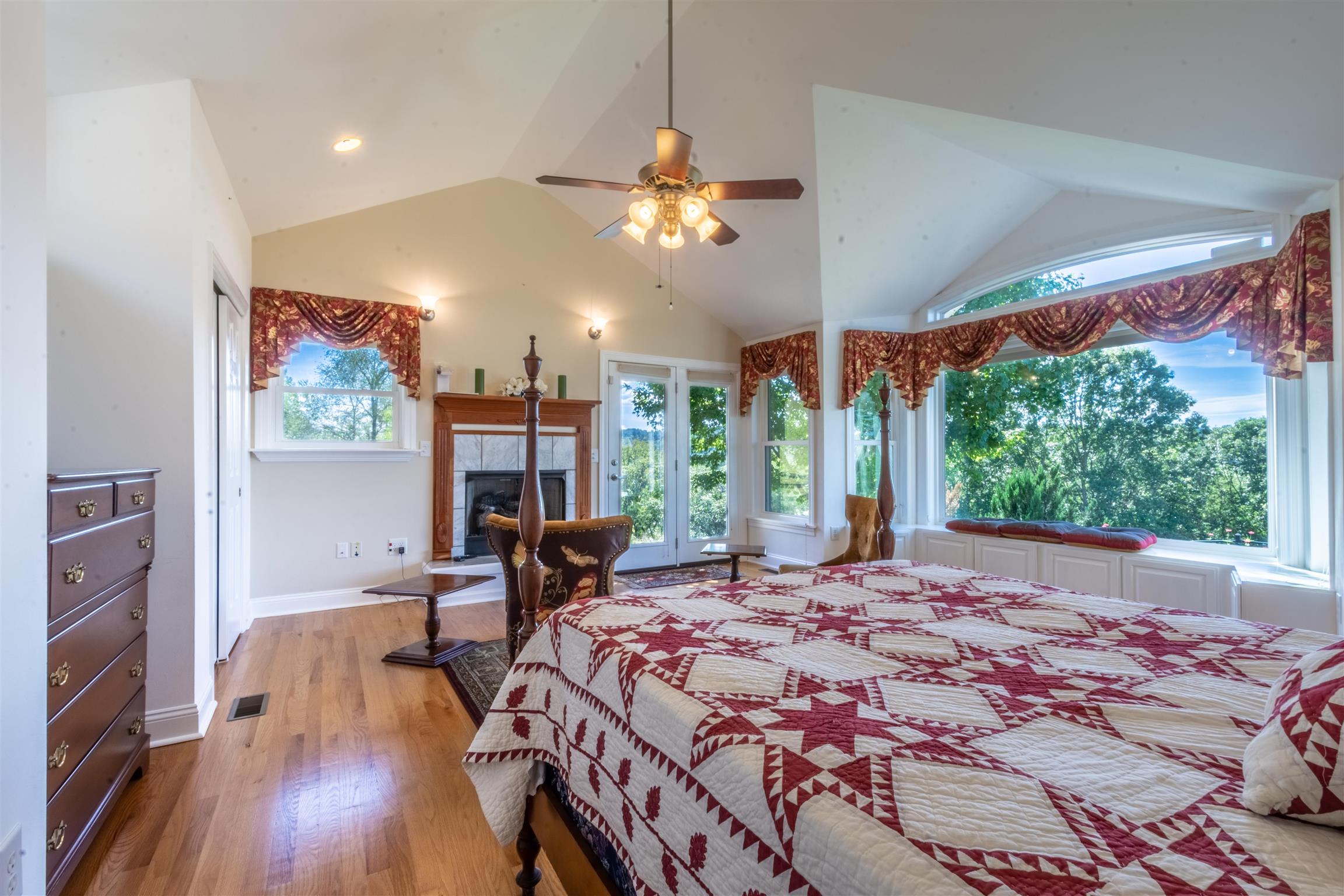 439 Agnew Road Pulaski, TN 38478 - Photo 14 of 30 a bedroom with a bed and wooden floor