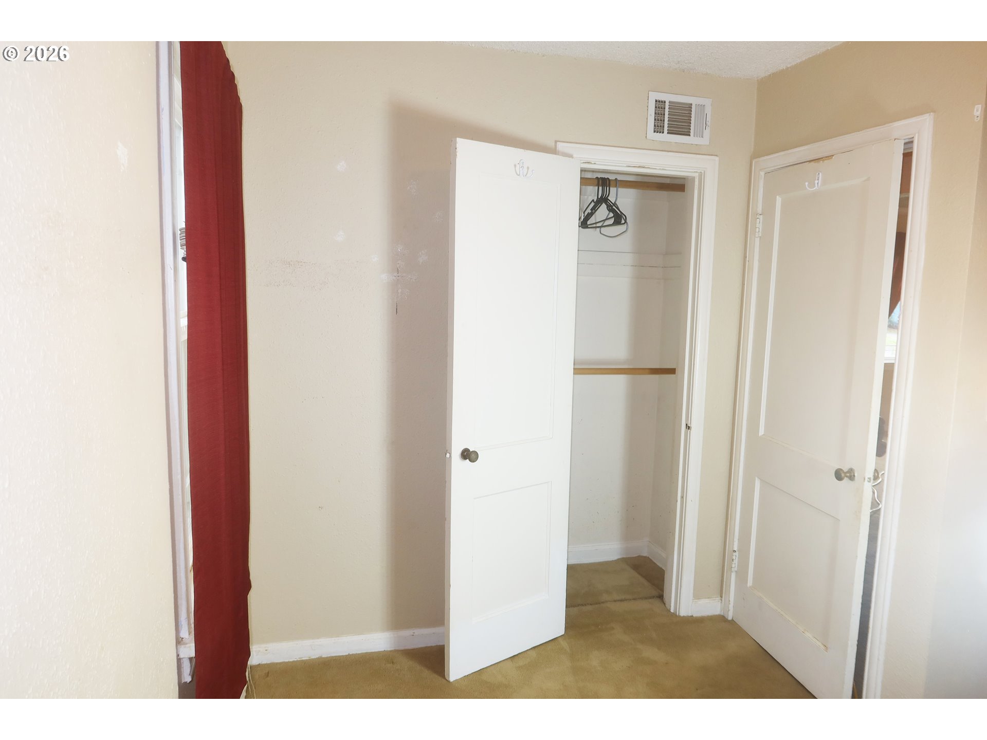138 Maple Boulevard Wood Village, OR 97060 - Photo 12 of 15 a view of a bedroom from a hallway