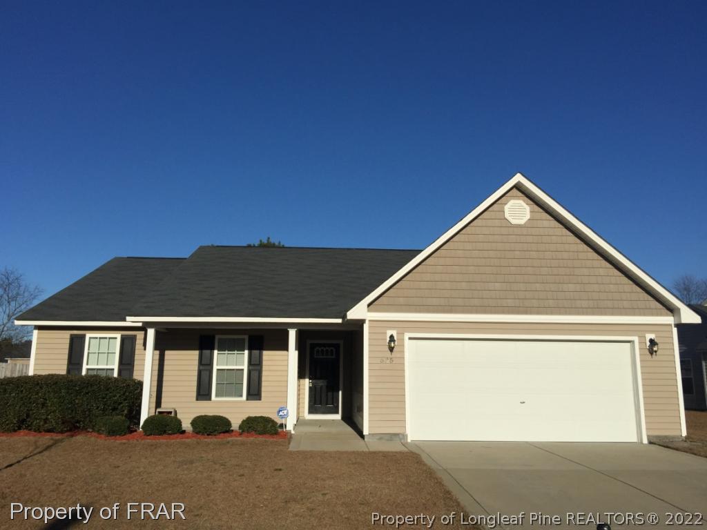 535 Cape Fear Road Raeford, NC 28376 - Photo 1 of 27 a front view of a house with a yard