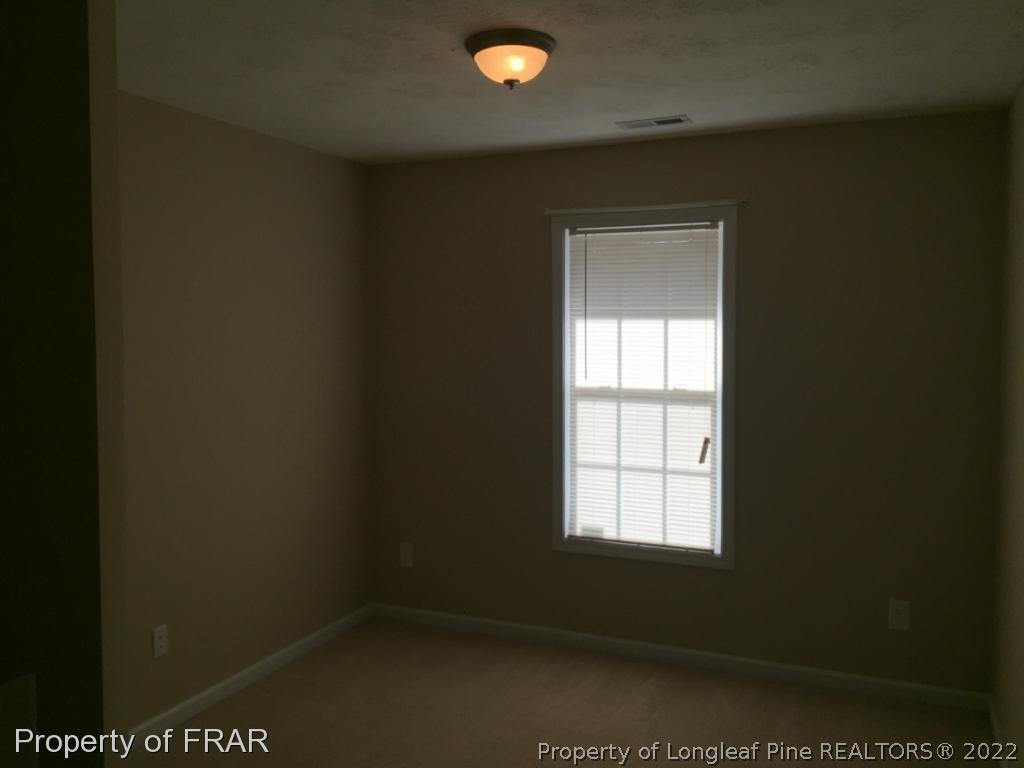 535 Cape Fear Road Raeford, NC 28376 - Photo 13 of 27 a view of an empty room and window