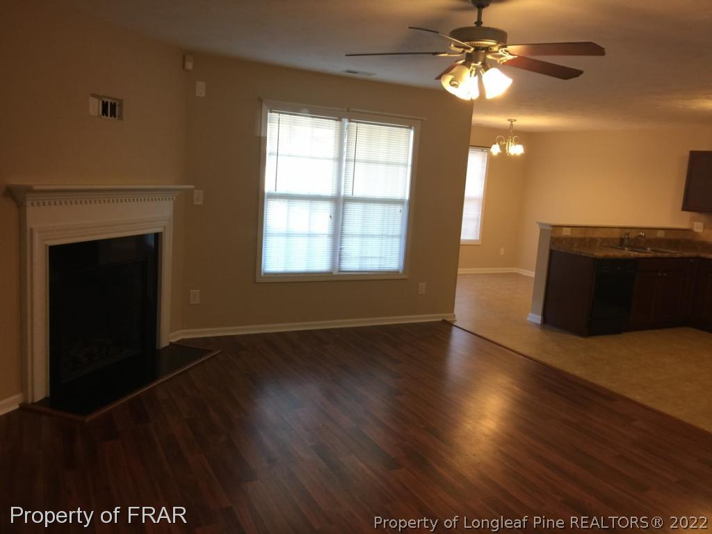 535 Cape Fear Road Raeford, NC 28376 - Photo 2 of 27 a view of a livingroom with a ceiling fan and window