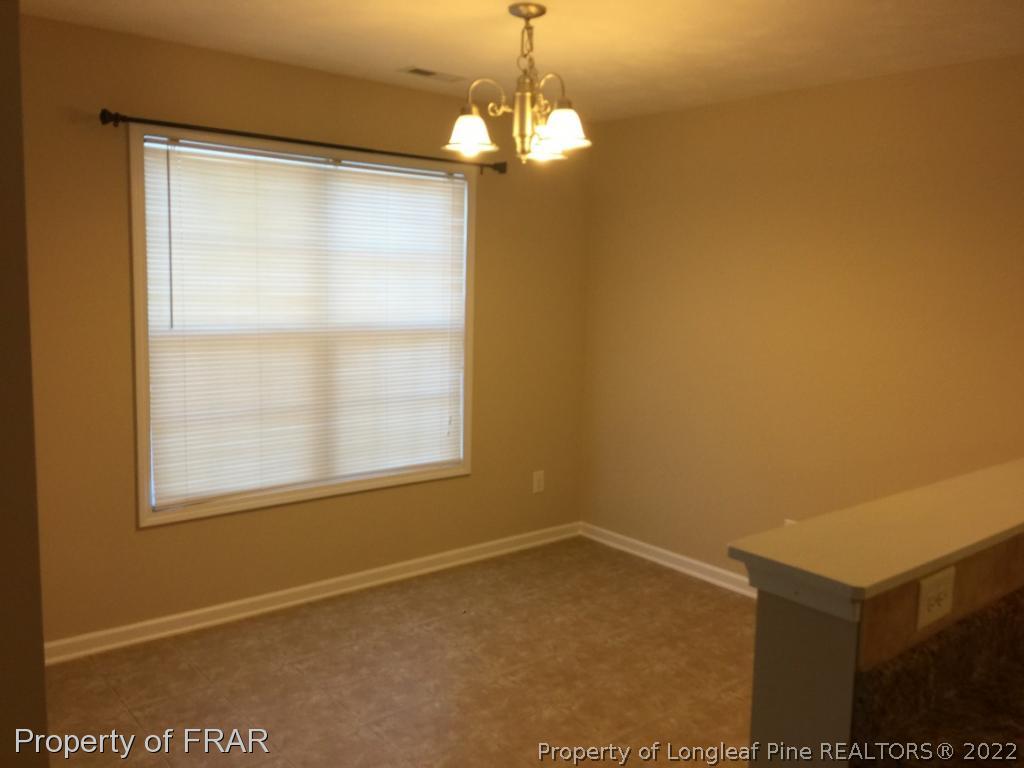 535 Cape Fear Road Raeford, NC 28376 - Photo 4 of 27 a view of an empty room with a window