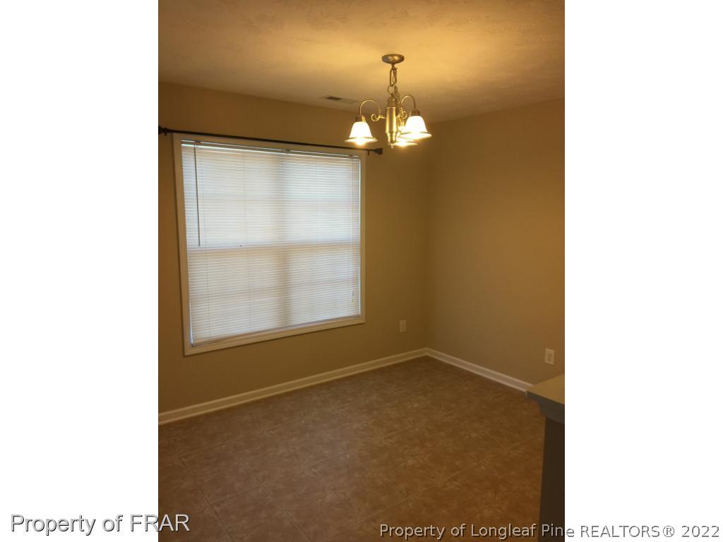 535 Cape Fear Road Raeford, NC 28376 - Photo 5 of 27 a view of a livingroom with a staircase
