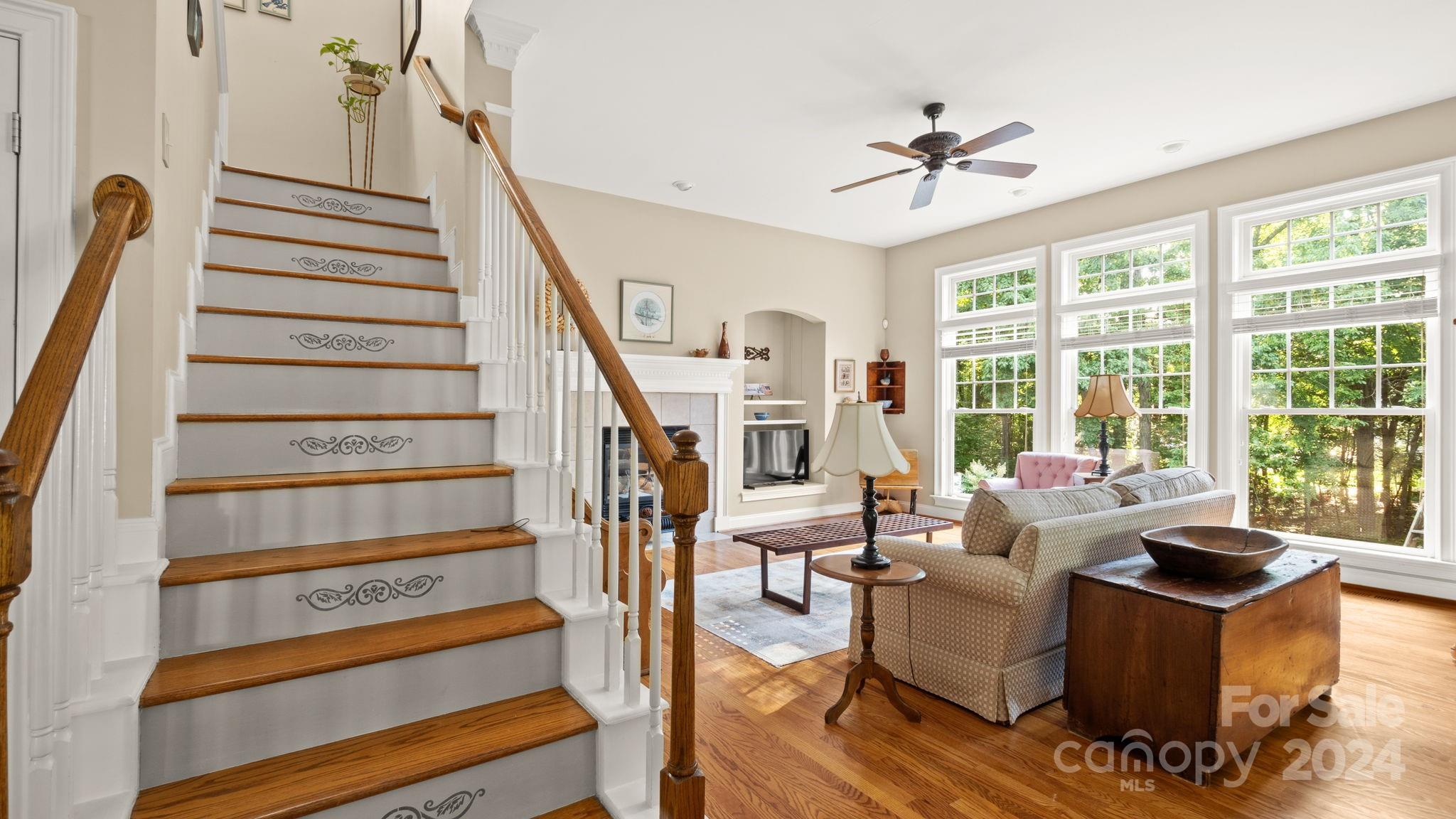 7121 Michael Scott Crossing Fort Mill, SC 29708 - Photo 11 of 46 a living room with furniture and wooden floor