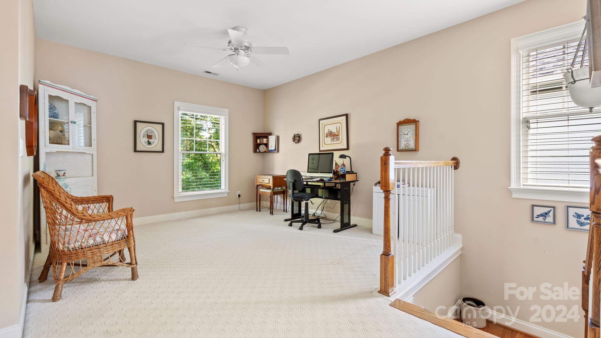 7121 Michael Scott Crossing Fort Mill, SC 29708 - Photo 21 of 46 a living room with furniture and next to a window