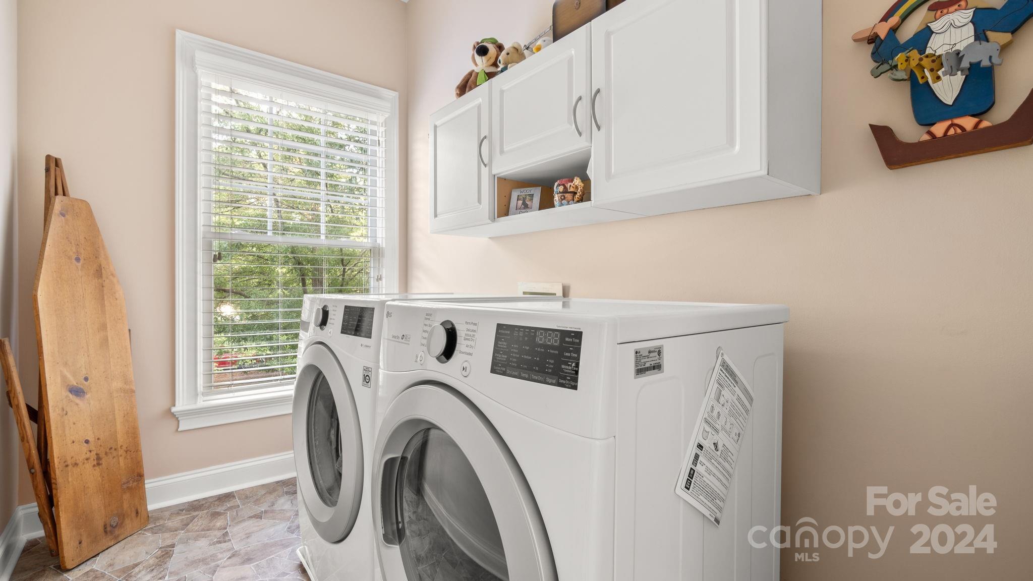 7121 Michael Scott Crossing Fort Mill, SC 29708 - Photo 36 of 46 a utility room with dryer and washer