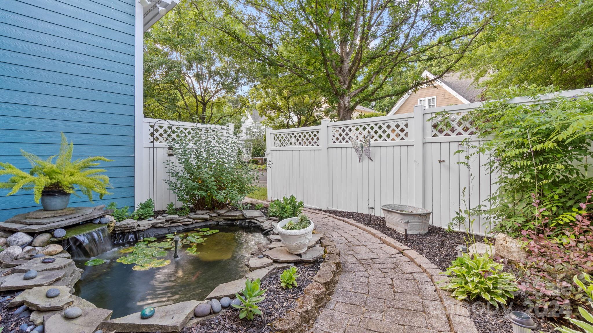 7121 Michael Scott Crossing Fort Mill, SC 29708 - Photo 43 of 46 a backyard of a house with outdoor seating