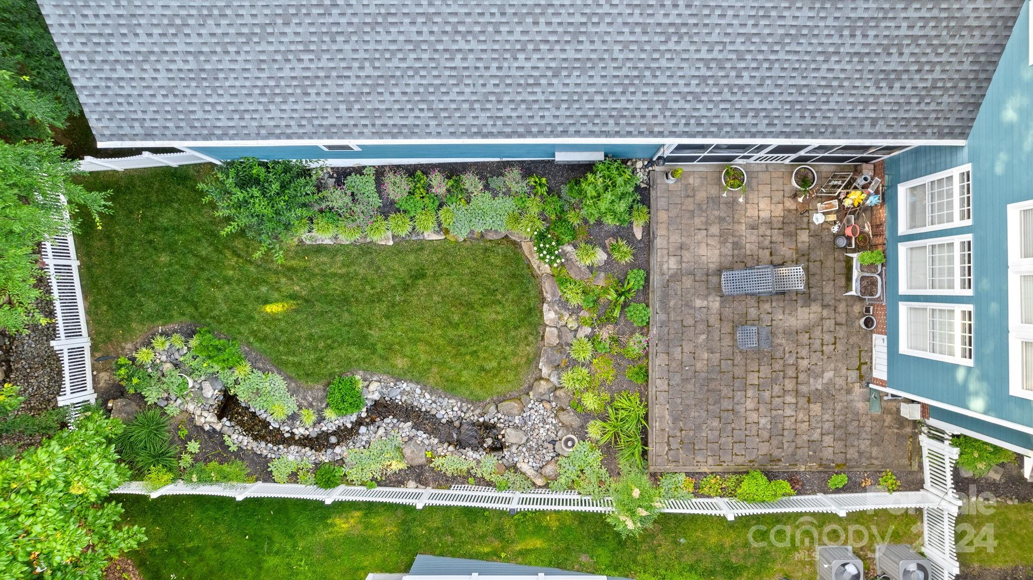 7121 Michael Scott Crossing Fort Mill, SC 29708 - Photo 46 of 46 a view of a backyard with plants