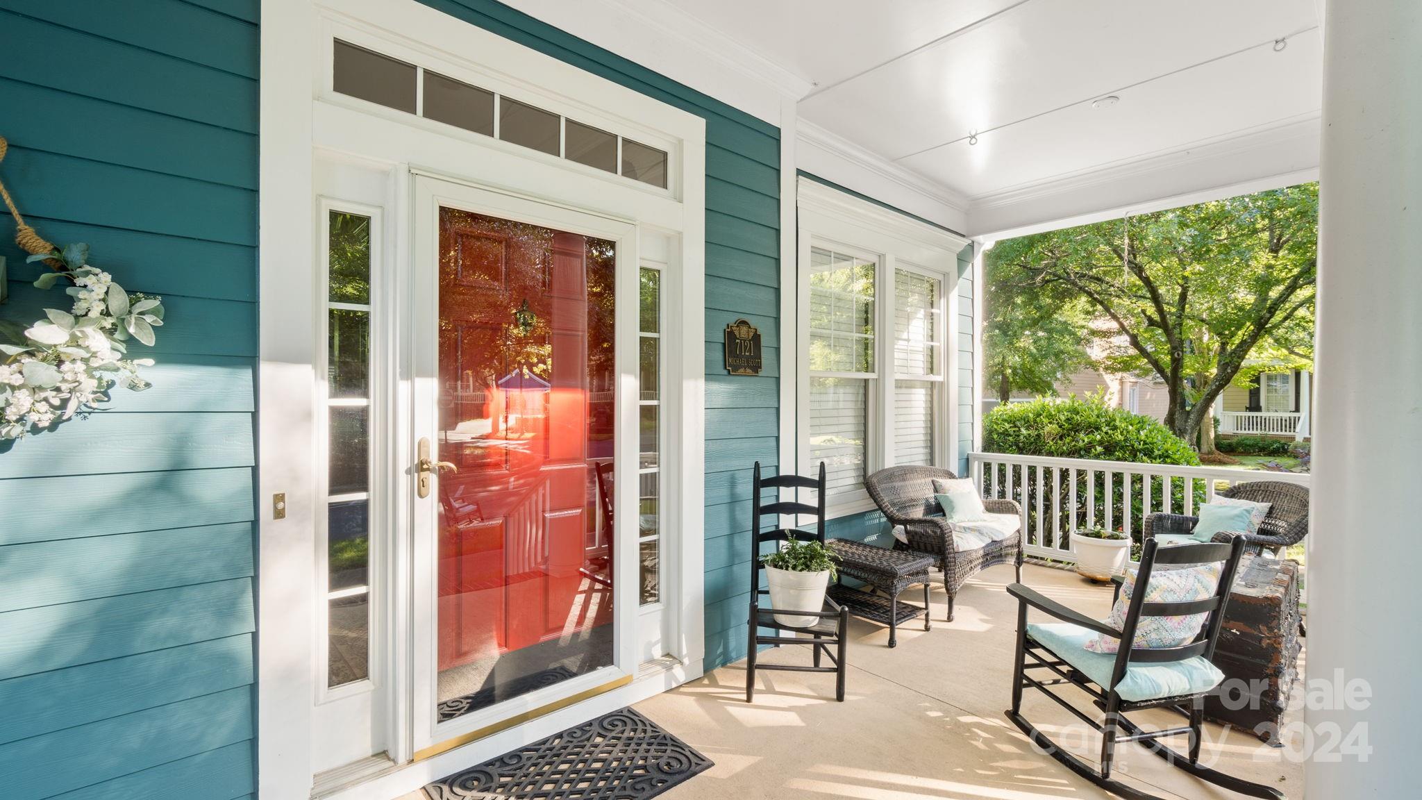 7121 Michael Scott Crossing Fort Mill, SC 29708 - Photo 5 of 46 a view of porch with a bench