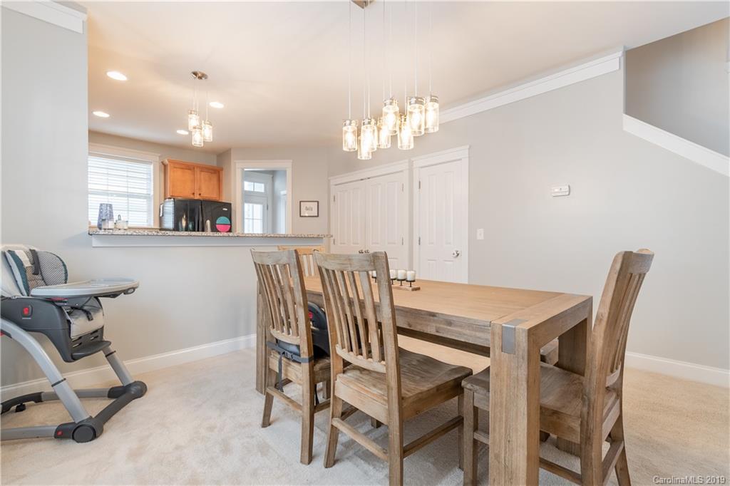4222 Vance Road North Huntersville, NC 28078 - Photo 11 of 36 a view of a dining room with furniture