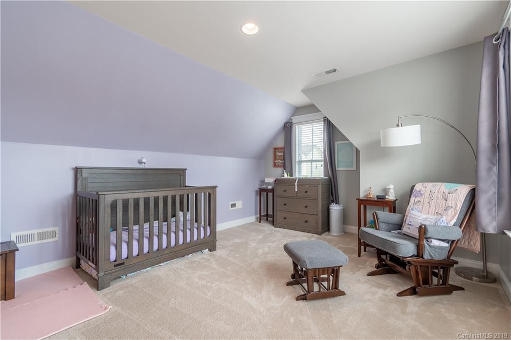 4222 Vance Road North Huntersville, NC 28078 - Photo 21 of 36 a living room with furniture and a chair