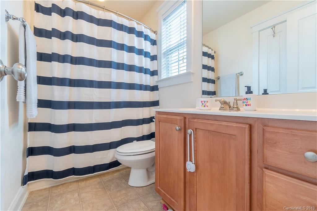4222 Vance Road North Huntersville, NC 28078 - Photo 23 of 36 a bathroom with a sink toilet and shower