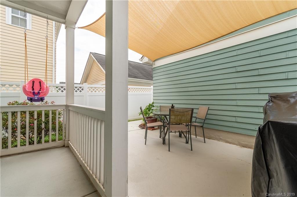 4222 Vance Road North Huntersville, NC 28078 - Photo 24 of 36 a balcony with table and chairs